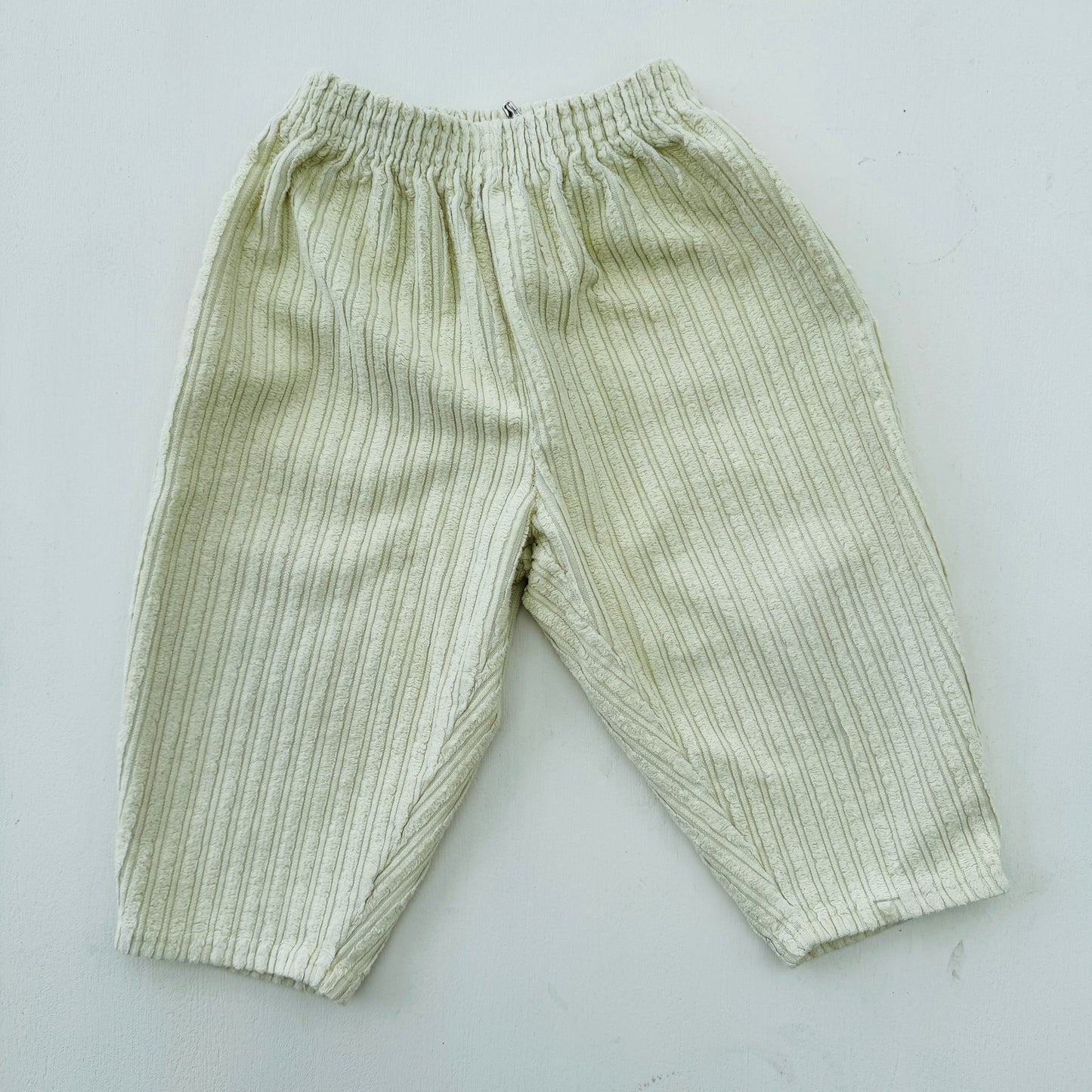 BROEK GEEL VELOURS (12-18M)