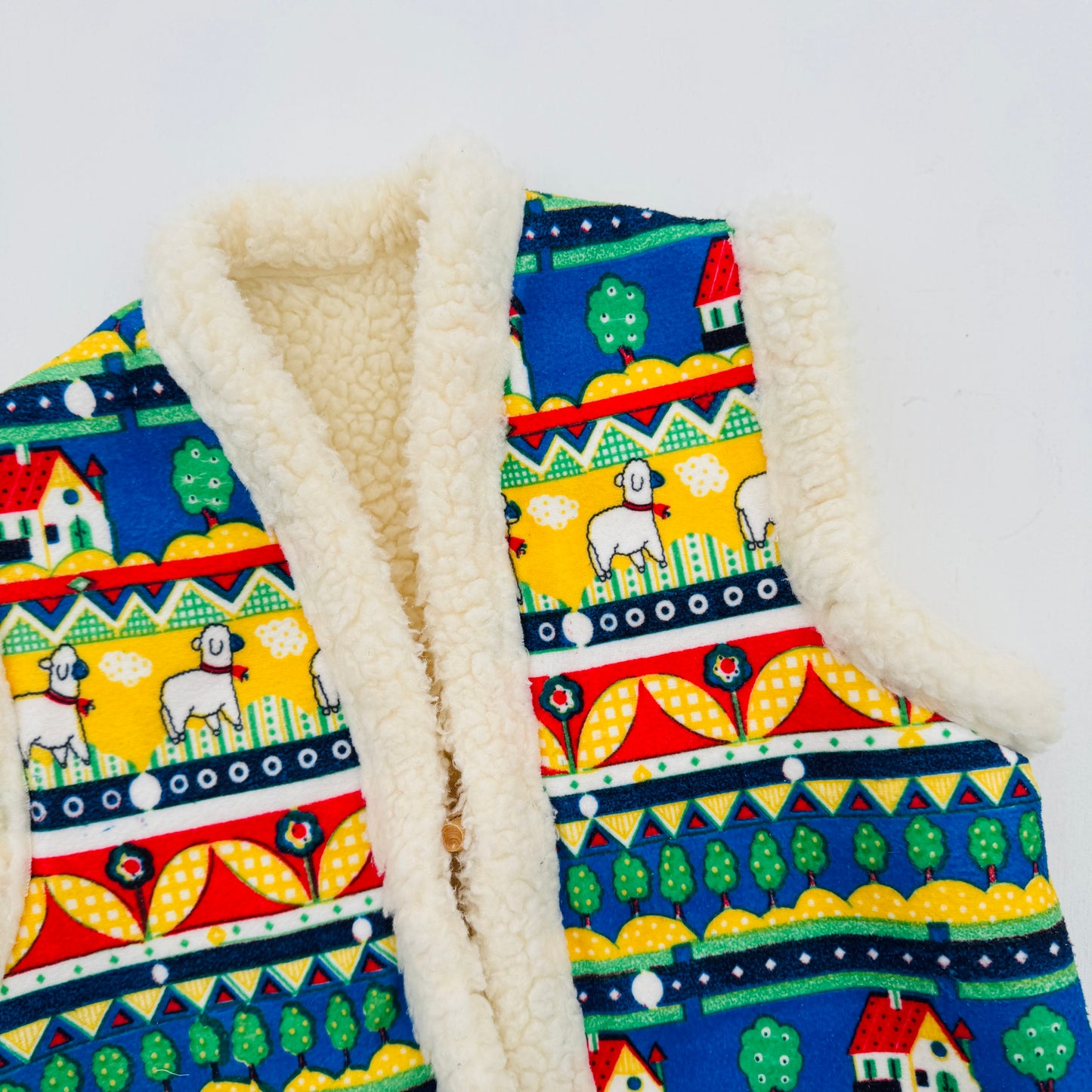 GILET MULTIKLEUR (3/4J)