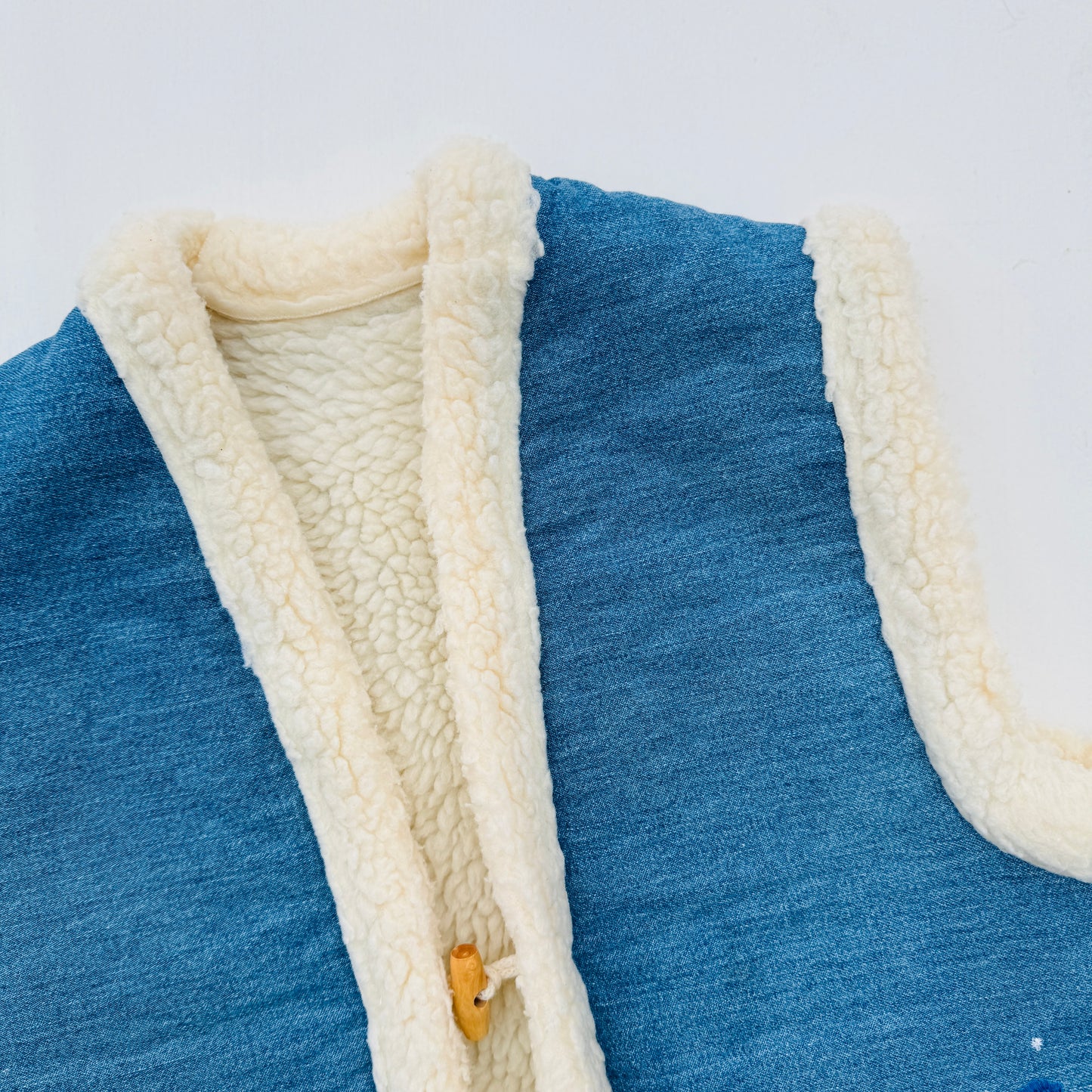 GILET BLAUW (6J)