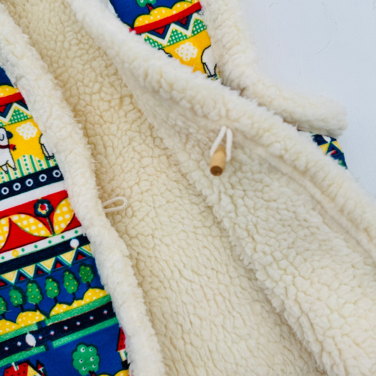 GILET MULTIKLEUR (3/4J)